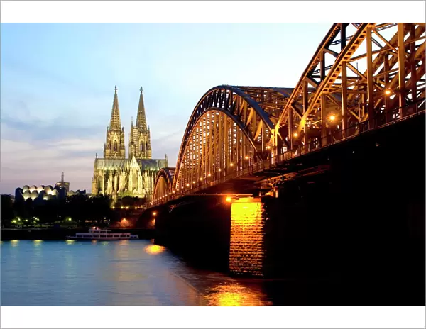 Cologne cathedral and Hohenzollern bridge at night
