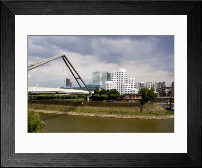 Framed Print : The Neuer Zollhof buildings by Frank Gehry at the Medienhafen Framed Print : The Neuer Zollhof buildings by Frank Gehry at the Medienhafen