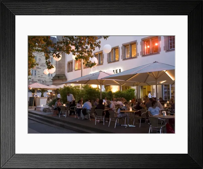 Framed Print : People sitting at an outdoors cafe