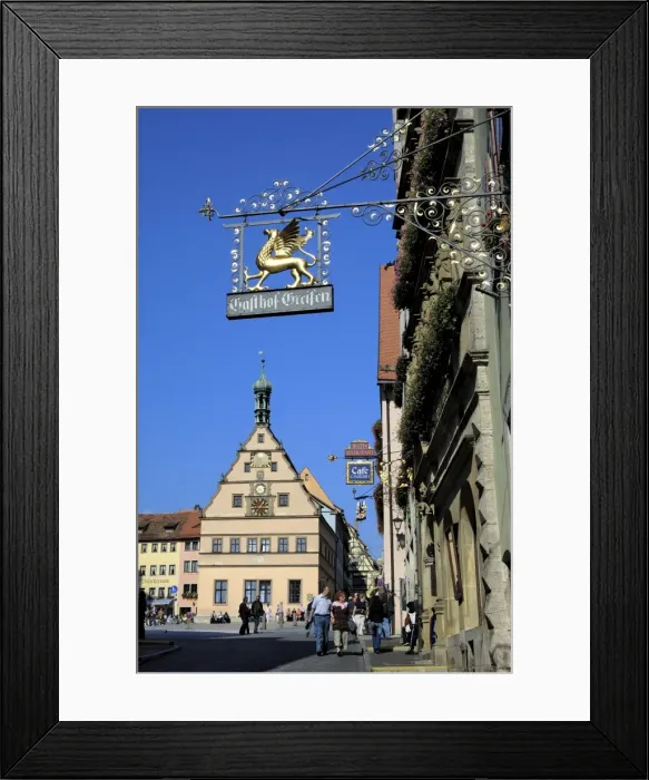 Framed Print : Ornate wrought iron shop sign with the Ratstrinkstube Framed Print : Ornate wrought iron shop sign with the Ratstrinkstube