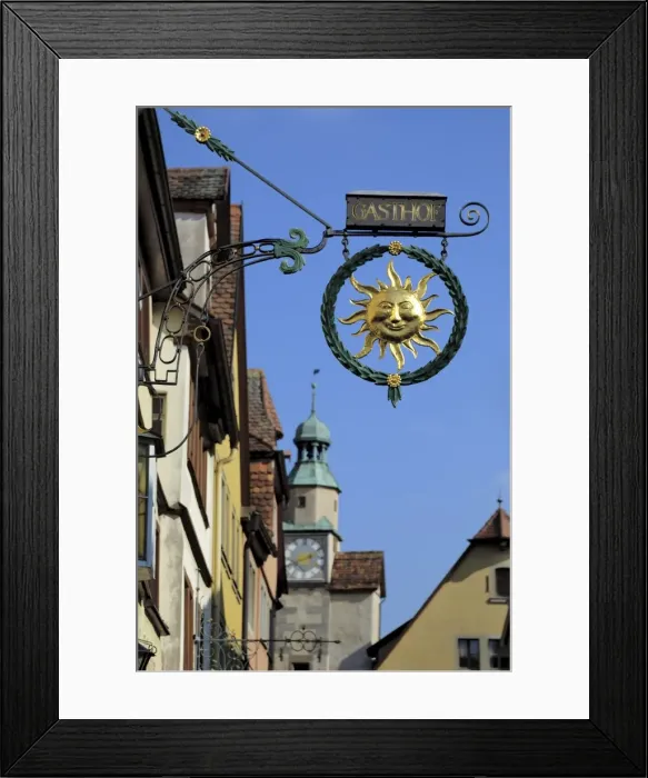 Framed Print : Ornate wrought iron shop sign advertising a gasthof (guesthouse) Framed Print : Ornate wrought iron shop sign advertising a gasthof (guesthouse)