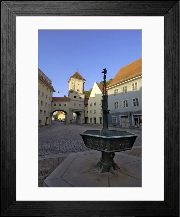 Framed Print : Fountain and the Sandauertor (Sandau Gateway) in the city walls