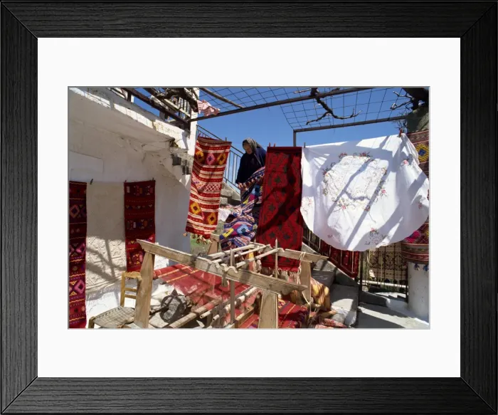 Framed Print : Woman weaver selling her blankets in village near Lasithi Plateau Framed Print : Woman weaver selling her blankets in village near Lasithi Plateau