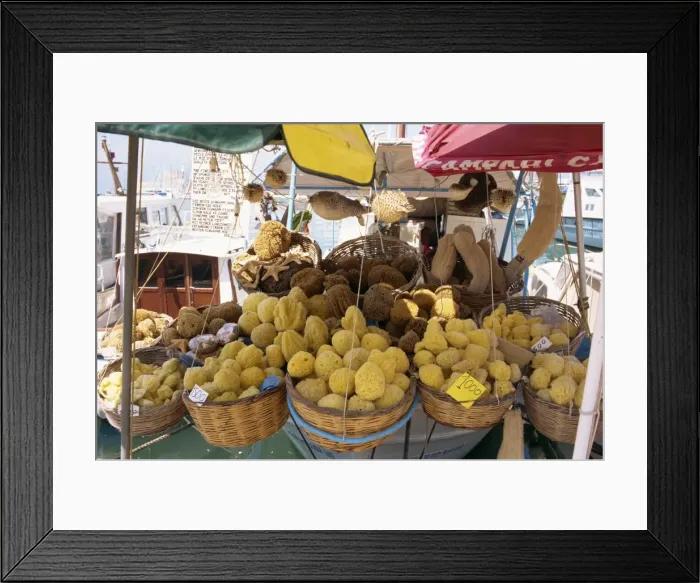 Framed Print : Sponges for sale on a stall on the quayside on the island of Rhodes