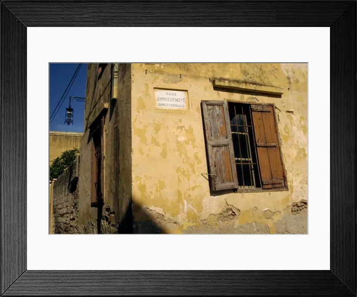 Framed Print : Street corner with shuttered window and street sign Framed Print : Street corner with shuttered window and street sign
