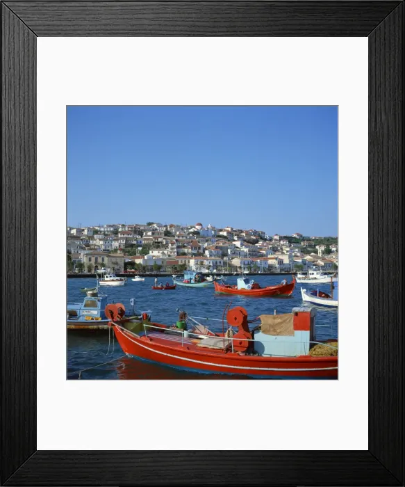 Framed Print : Red and blue painted fishing boats in the harbour in Framed Print : Red and blue painted fishing boats in the harbour in