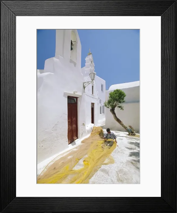 Framed Print : Fisherman repairing his nets Framed Print : Fisherman repairing his nets
