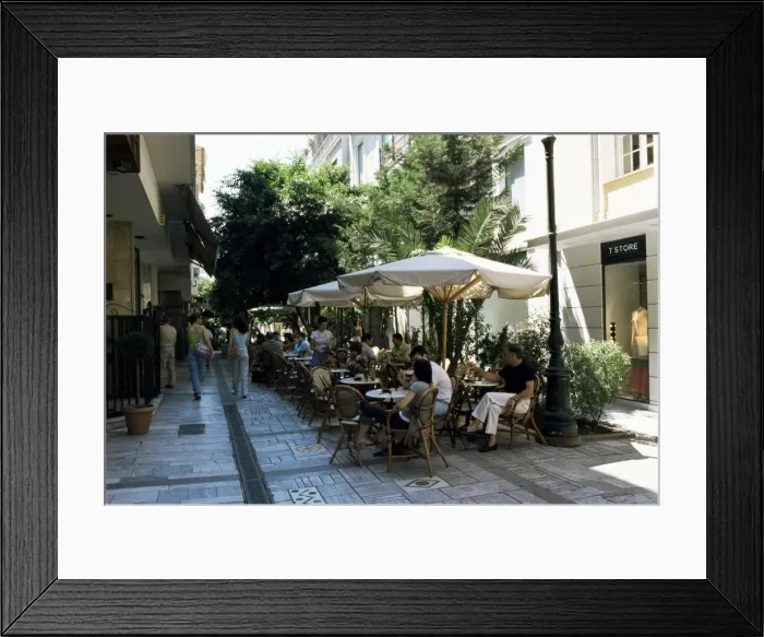 Framed Print : Chic cafe and fashion shop area Framed Print : Chic cafe and fashion shop area