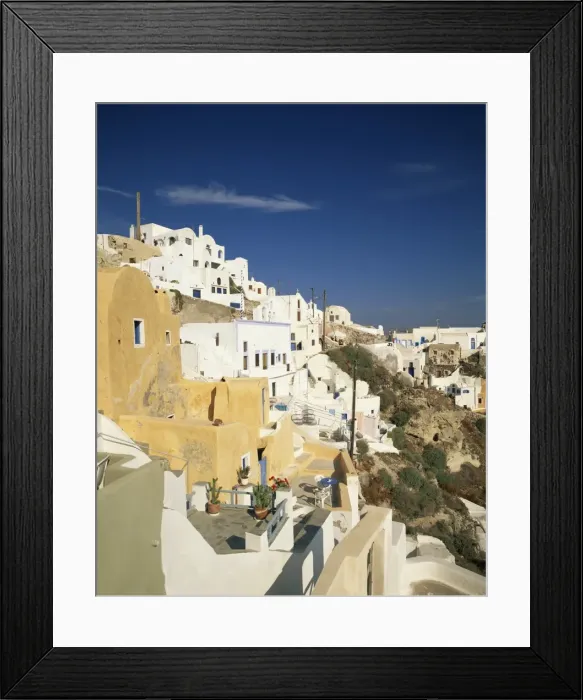 Framed Print : Terrace balconies and white houses of the village of Oia Framed Print : Terrace balconies and white houses of the village of Oia