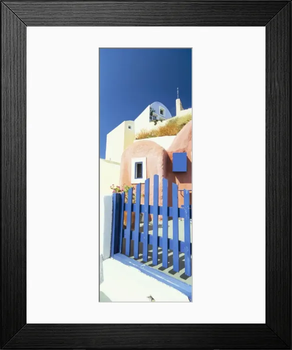 Framed Print : Painted houses and blue gate Framed Print : Painted houses and blue gate