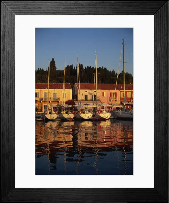 Framed Print : Reflections of boats in the evening at Fiskardo Framed Print : Reflections of boats in the evening at Fiskardo