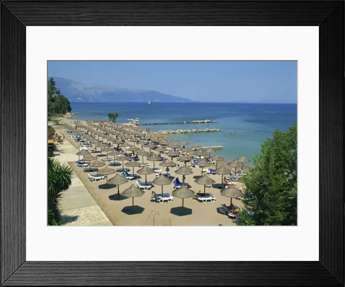 Framed Print : Beach umbrellas on coast near Dassia Framed Print : Beach umbrellas on coast near Dassia