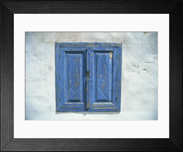 Framed Print : Blue window shutters and white walls Framed Print : Blue window shutters and white walls