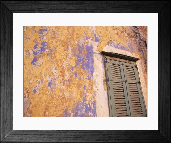 Framed Print : Peeling blue and ochre wall and shutters Framed Print : Peeling blue and ochre wall and shutters