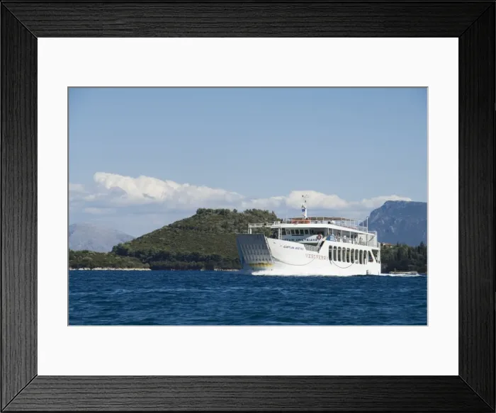 Framed Print : Ferry passing the Island of Skorpios owned by the Onassis family Framed Print : Ferry passing the Island of Skorpios owned by the Onassis family