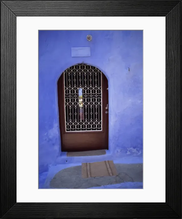 Framed Print : Close-up of doorway with grille built into blue wall Framed Print : Close-up of doorway with grille built into blue wall