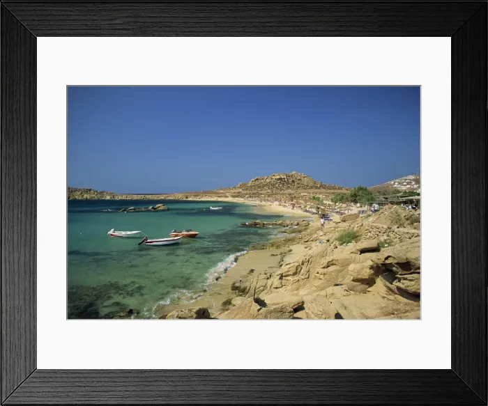 Framed Print : Rocky coastline with boats offshore at Piranga Beach Framed Print : Rocky coastline with boats offshore at Piranga Beach