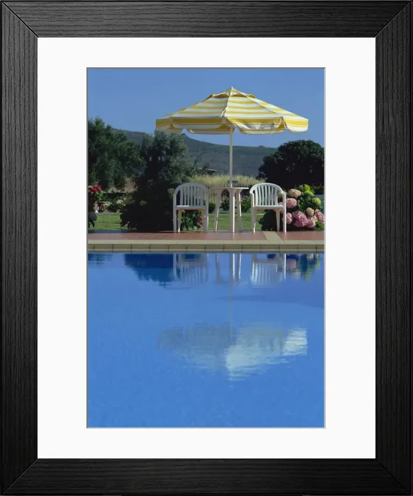 Framed Print : Umbrella and chairs Framed Print : Umbrella and chairs