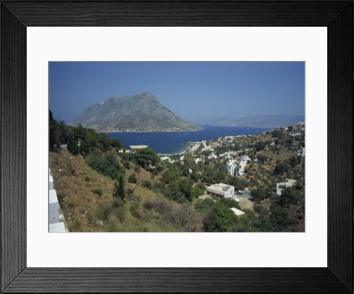Framed Print : The island of Telendos in Panormos Bay on the island of Kalymnos Framed Print : The island of Telendos in Panormos Bay on the island of Kalymnos