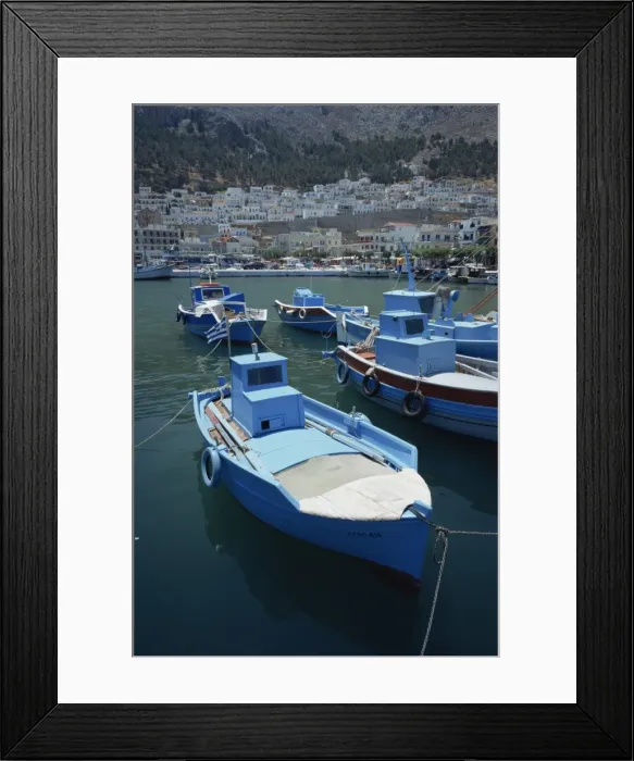 Framed Print : Blue sponge fishing boats in the harbour of Pothia Framed Print : Blue sponge fishing boats in the harbour of Pothia