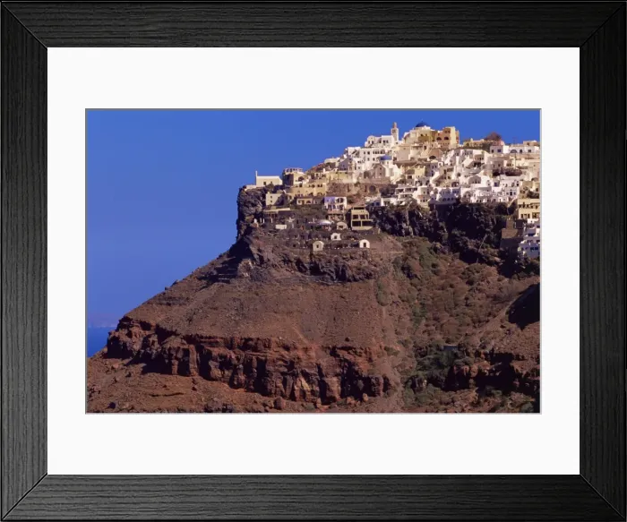 Framed Print : Imerovigli village perched on red volcanic hill Framed Print : Imerovigli village perched on red volcanic hill