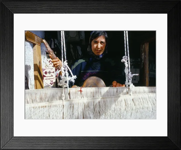 Framed Print : Local weaver spinning wool Framed Print : Local weaver spinning wool