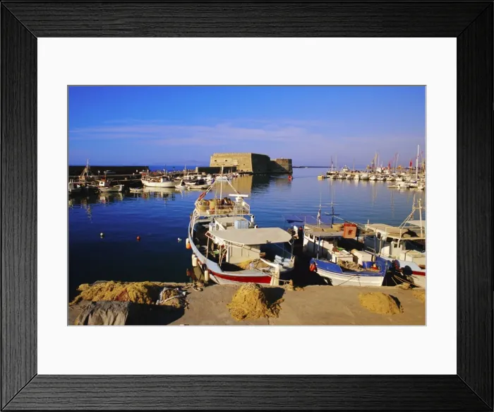 Framed Print : Fishing boats and Venetian fortress at Iraklion old harbour Framed Print : Fishing boats and Venetian fortress at Iraklion old harbour