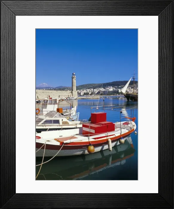 Framed Print : View of old Venetian Rethymo harbour and lighthouse in background Framed Print : View of old Venetian Rethymo harbour and lighthouse in background