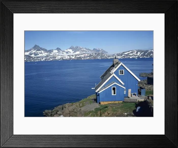 Framed Print : Blue painted wooden house on the coast Framed Print : Blue painted wooden house on the coast