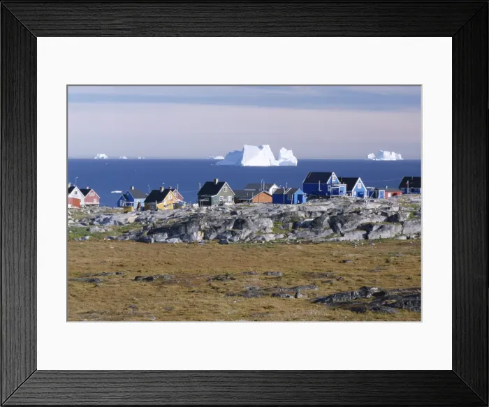 Framed Print : Painted village houses in front of icebergs in Disko Bay Framed Print : Painted village houses in front of icebergs in Disko Bay