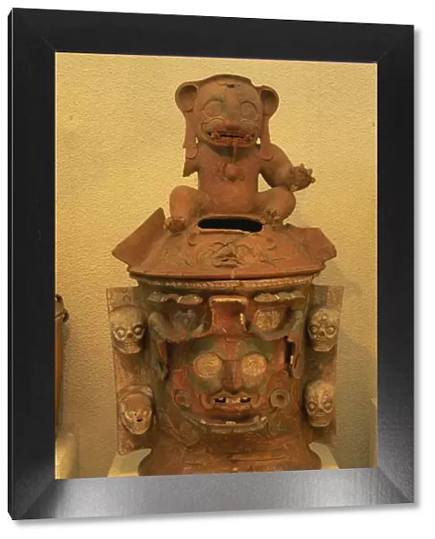 Close-up of a Mayan funerary urn in the Popol Vuh Museum