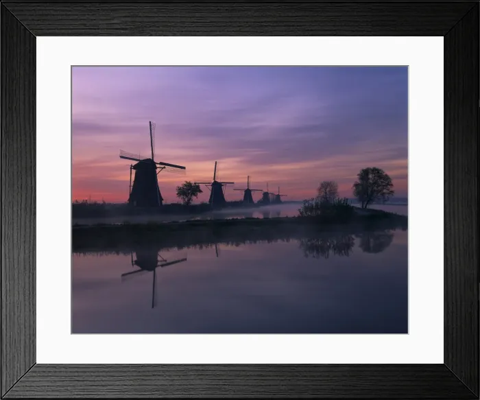 Framed Print : Reflections of a line of windmills in a misty landscape at Kinderdjik Framed Print : Reflections of a line of windmills in a misty landscape at Kinderdjik