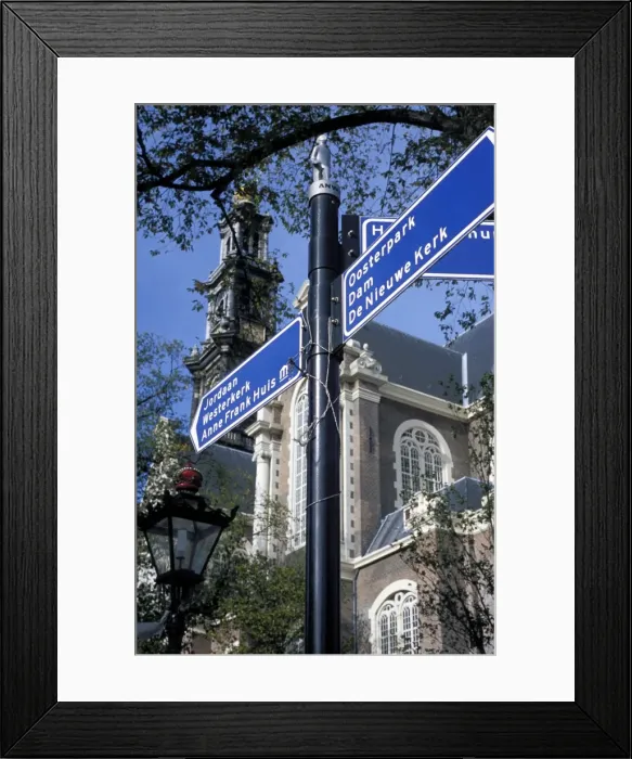 Framed Print : Close-up of direction sign for major sights along canal Framed Print : Close-up of direction sign for major sights along canal