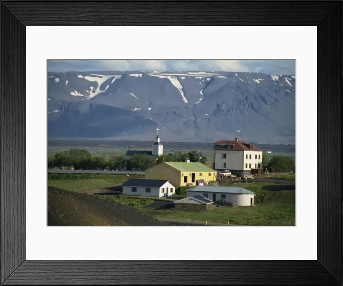 Framed Print : Village and church south of Lake Myvatn with hills in the background
