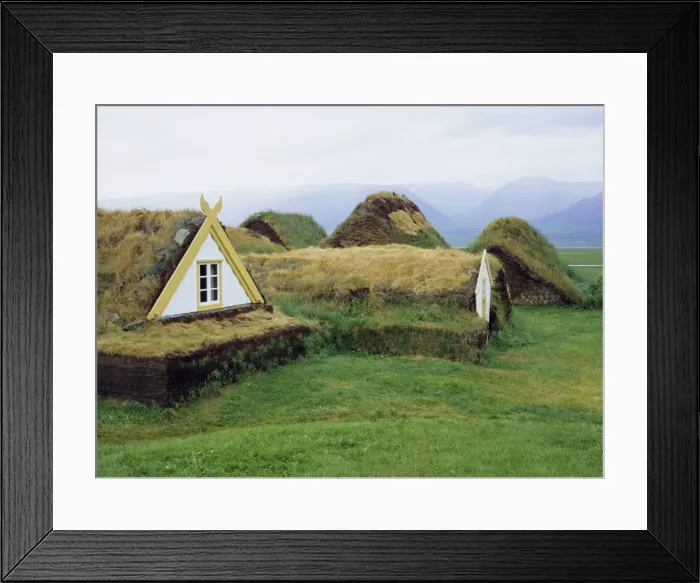 Framed Print : Buildings with turf roof and walls