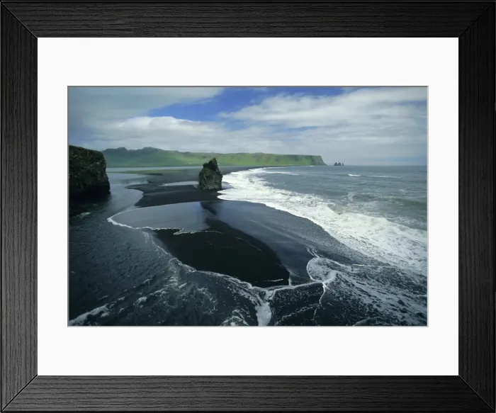 Framed Print : Black volcanic sand and sea stack at south coast bird sanctuary Framed Print : Black volcanic sand and sea stack at south coast bird sanctuary