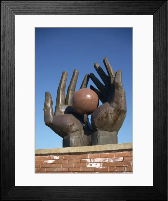 Framed Print : Granite world in iron hands Framed Print : Granite world in iron hands