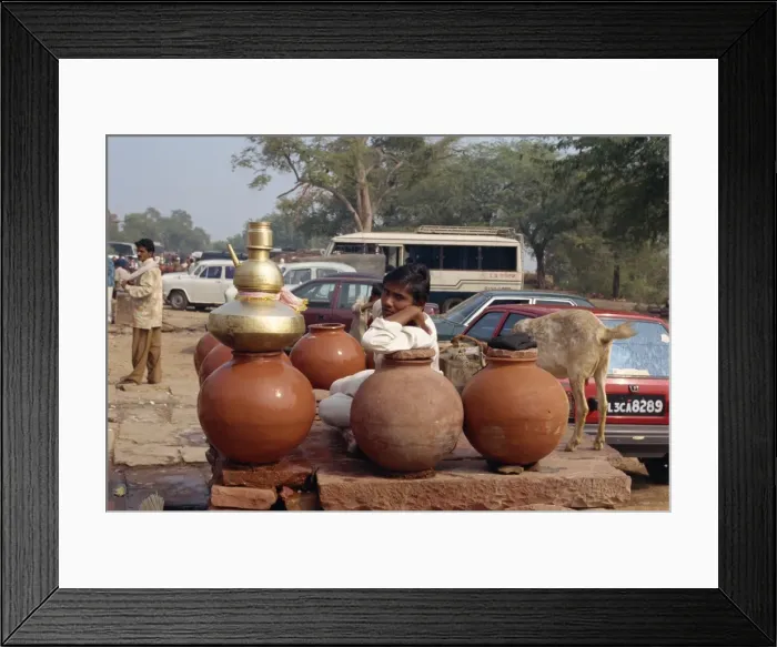 Framed Print : Water pots by the road
