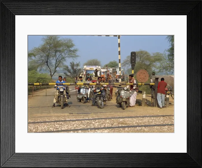 Framed Print : Traffic waiting at railway crossing Framed Print : Traffic waiting at railway crossing