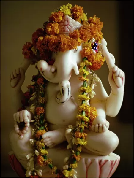 Garlands on statue of the Hindu God Ganesh
