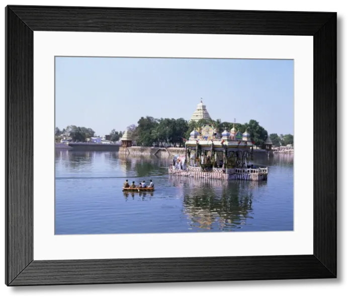 Framed Print : A barge carrying images of Shiva and Meenakshi being Framed Print : A barge carrying images of Shiva and Meenakshi being