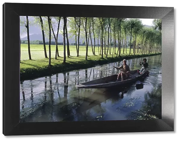 Paddy fields and waterway with local boat