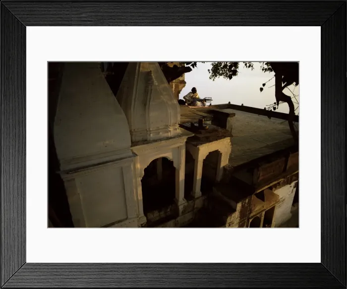 Framed Print : Man playing sarod on terrace Framed Print : Man playing sarod on terrace
