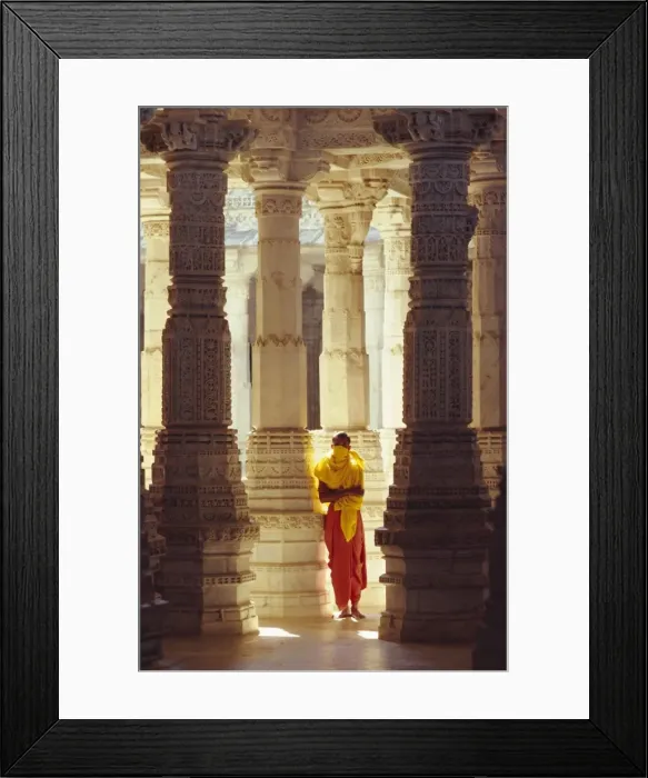 Framed Print : Jain covering his mouth in the interior of the Adinath Temple complex