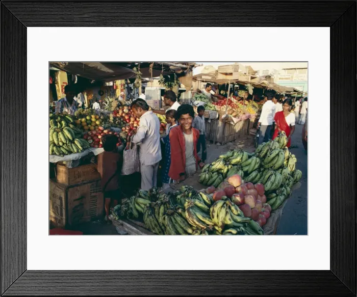Framed Print : Fruit including bananas for sale in the market
