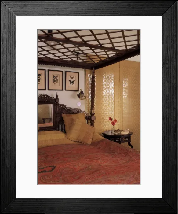 Framed Print : Colonial style bed and traditional chic blinds at window Framed Print : Colonial style bed and traditional chic blinds at window
