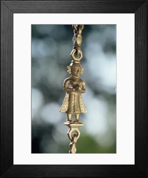 Framed Print : Detail of brass chain from which a swing chair Framed Print : Detail of brass chain from which a swing chair