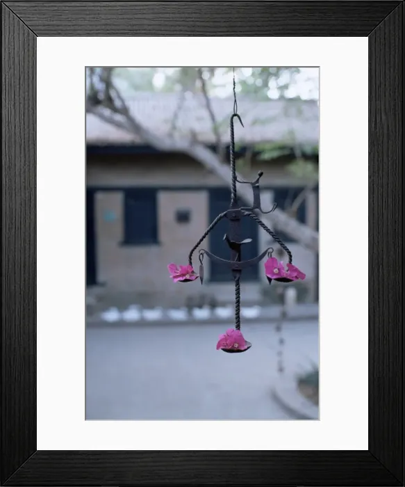 Framed Print : Decorative tribal metal sculpture outside a house Framed Print : Decorative tribal metal sculpture outside a house