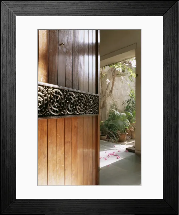 Framed Print : A modern front door decorated with a 400 year old piece Framed Print : A modern front door decorated with a 400 year old piece