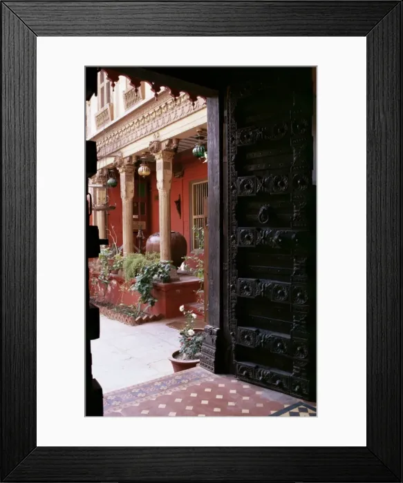 Framed Print : Traditional wood door and 19th century floor tiles